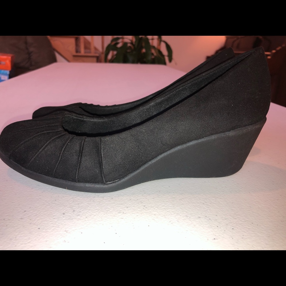Brand New! Women’s black wedge pump size 9